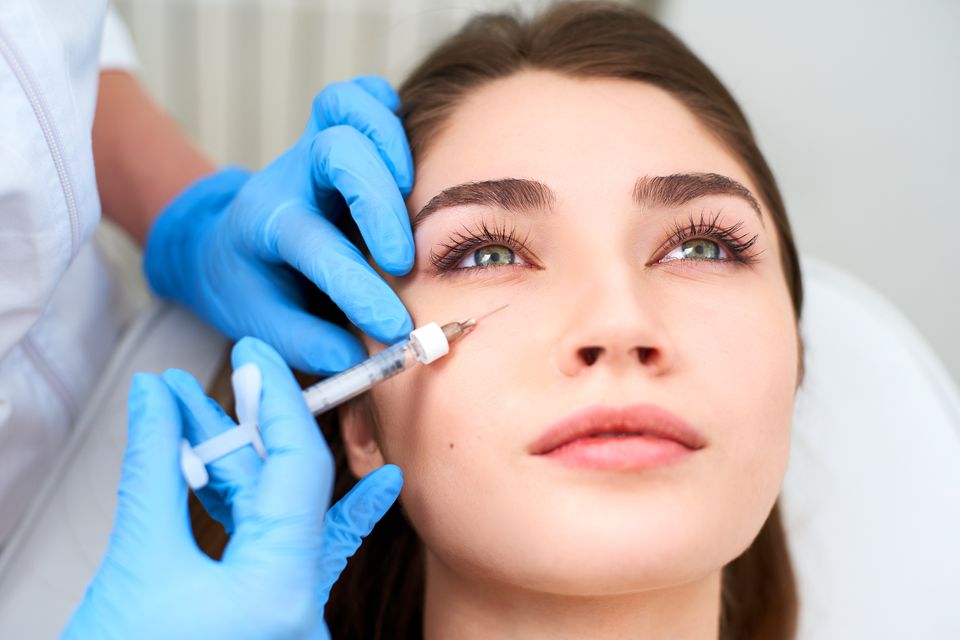 Polynucleotides derived from salmon DNA are injected into the face during a salmon sperm treatment. Photo: Getty